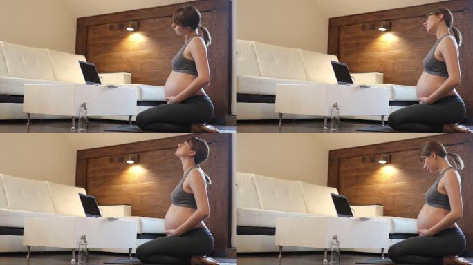 孕妇在家做瑜伽