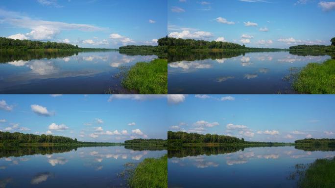 平静的河流和云朵户外延时蓝天白云清澈的河