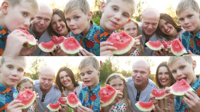 一家人在野餐吃西瓜