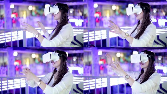 这位年轻女子戴着虚拟现实眼镜很开心。