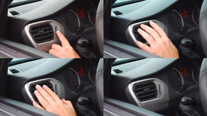 司机的手控制汽车仪表板