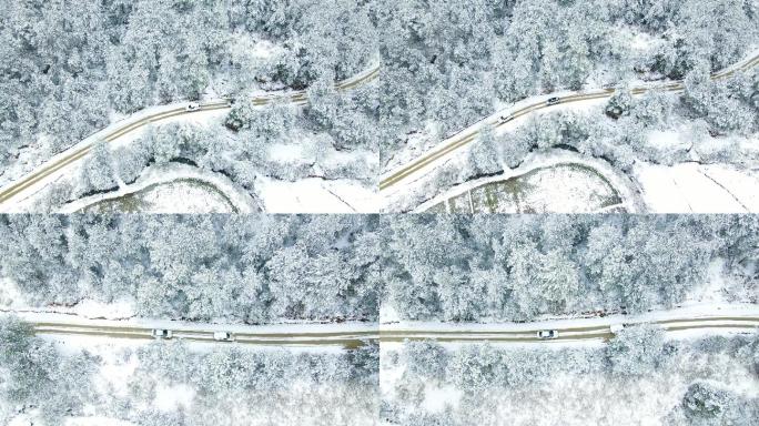 航拍森林雪景道路汽车大雪纷飞意境素材
