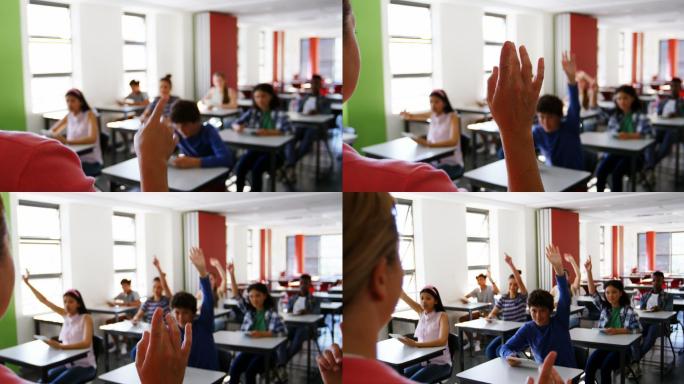 学生们在教室里举手