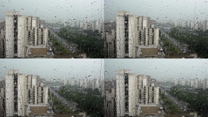 雨滴从玻璃窗滴下