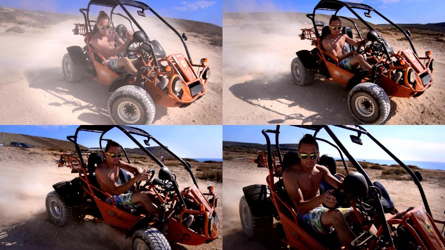 在沙漠里驾驶越野赛车的男人