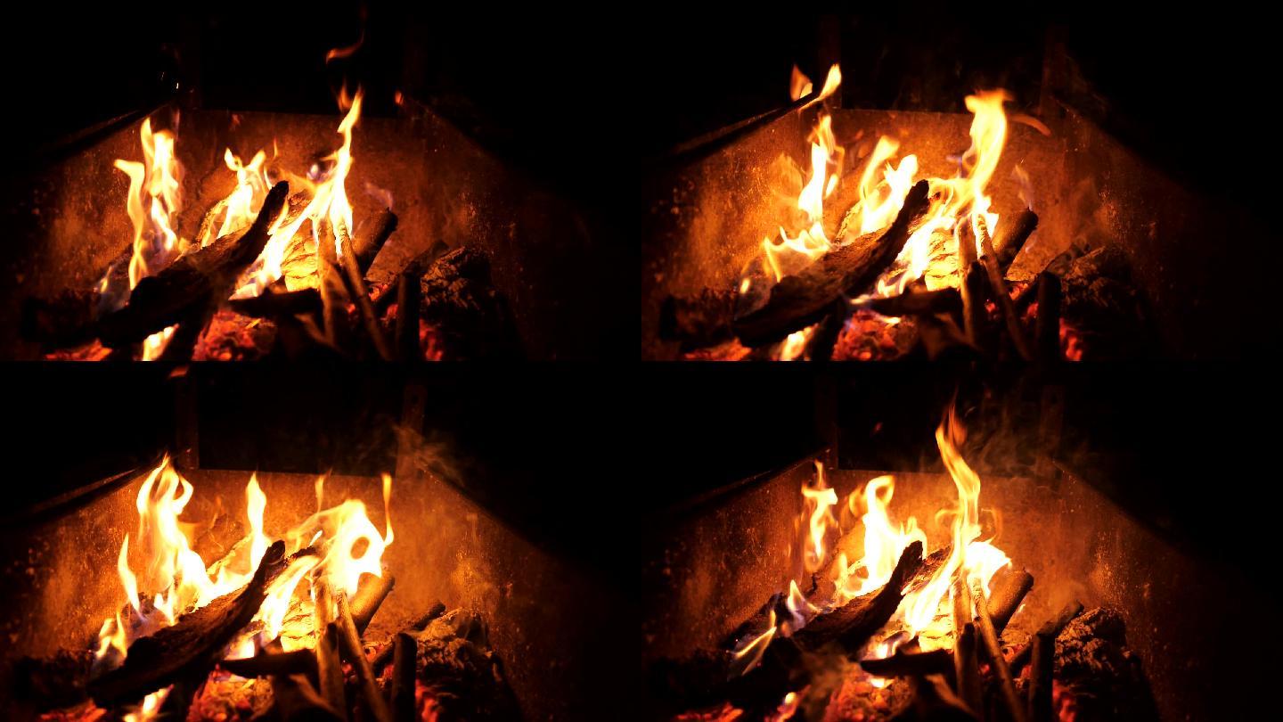 黑暗中金属火盆里的篝火