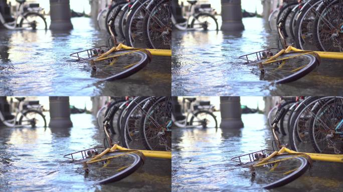 许多自行车在被水淹没的城市中间