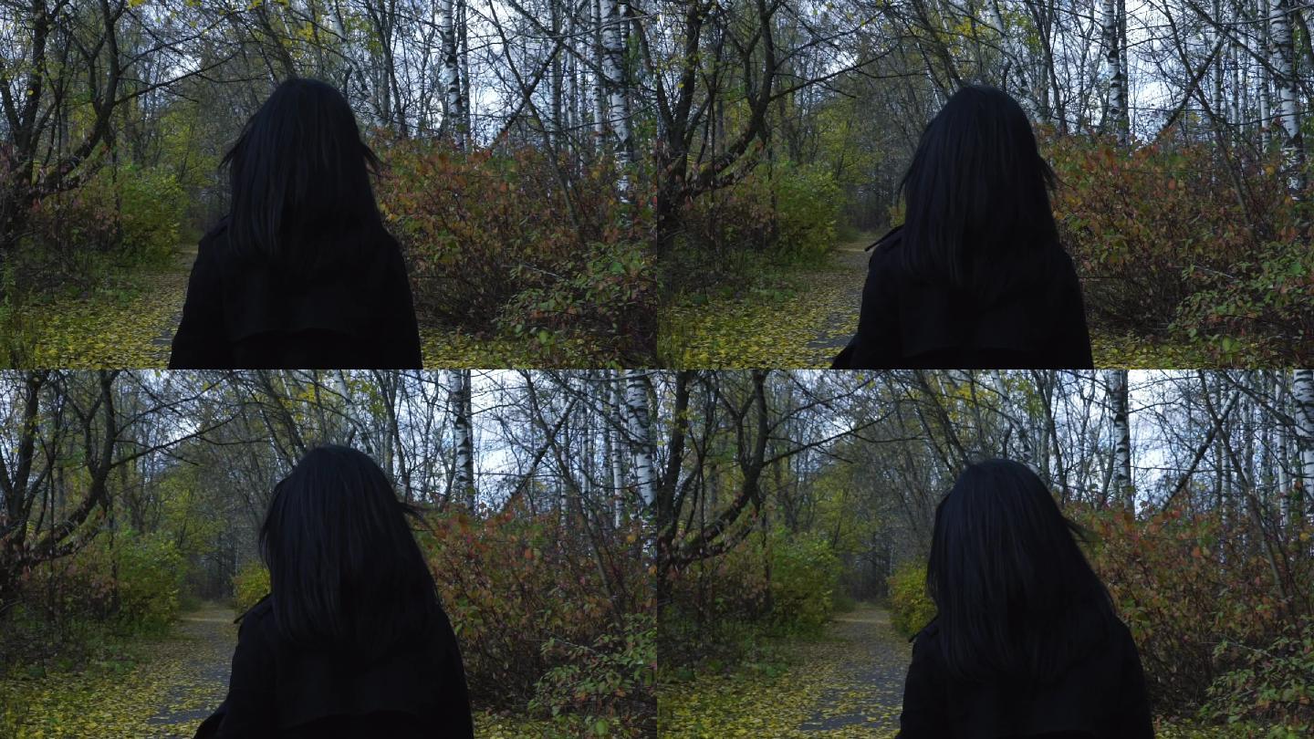 森林里的黑发女孩