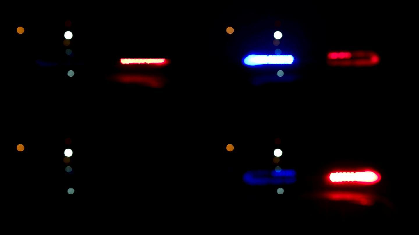 警车的灯在晚上闪烁