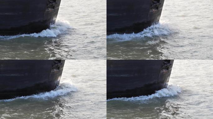 黄浦江货轮的特写推波前行江水海水浪涛浪头