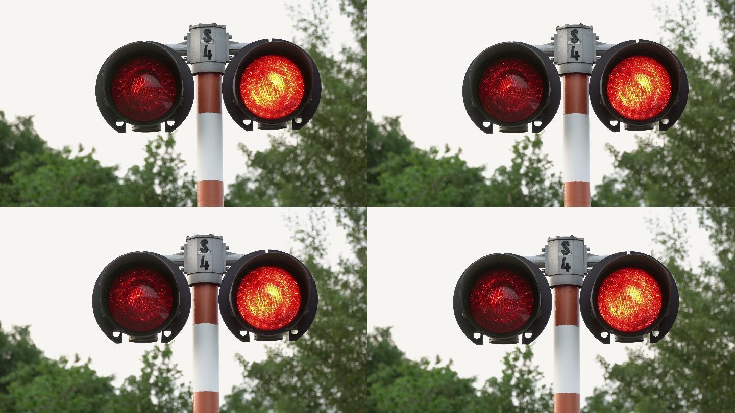 红色的铁路道口信号。