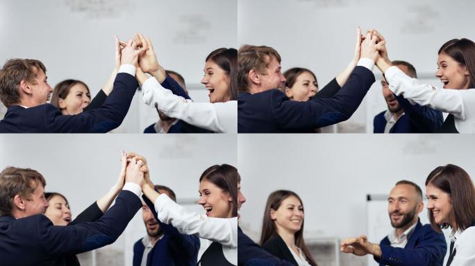 商人微笑着在办公室庆祝胜利