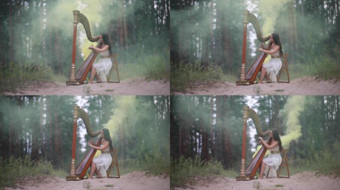 女竖琴手在森林表演