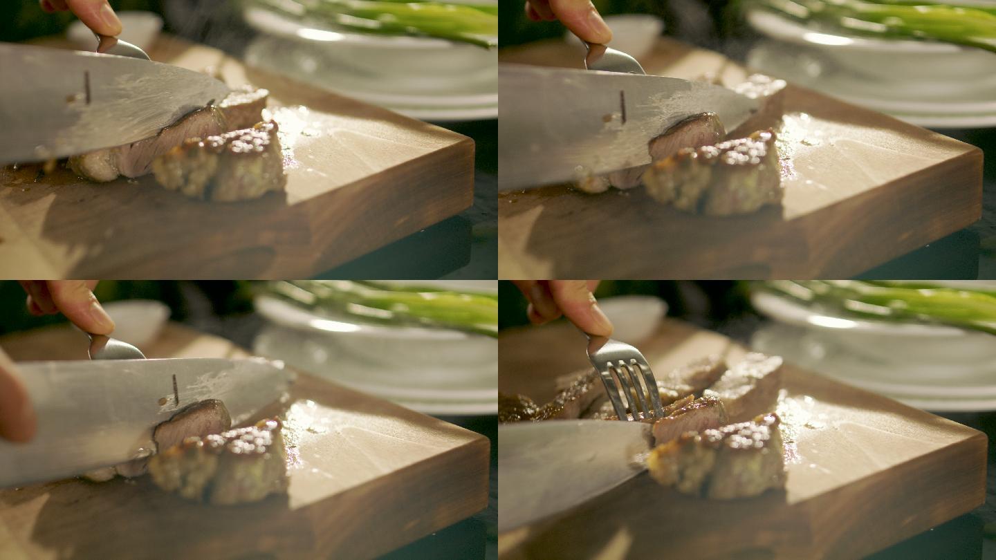 用刀叉在砧板上切割牛肉