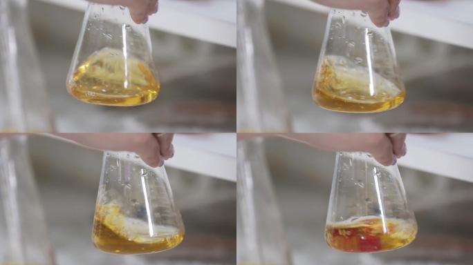 在实验室设备上分析威士忌样品。