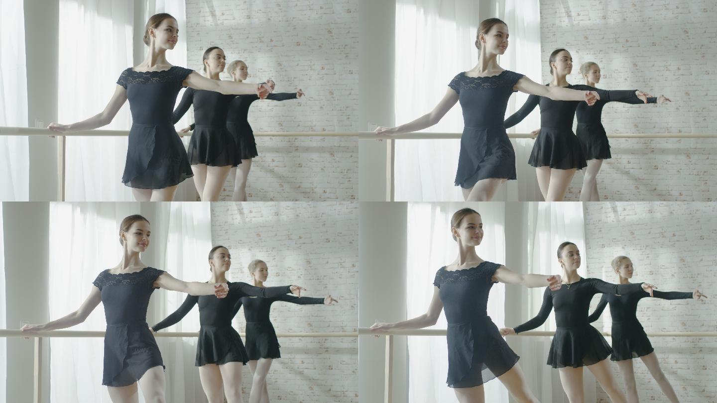 三位年轻美丽的芭蕾舞演员在练习舞蹈。