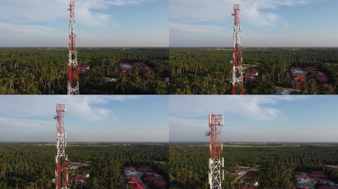 马来西亚农村种植园鸟瞰图中的电信塔
