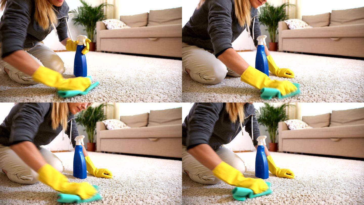 家庭主妇用清洁剂清洁地毯