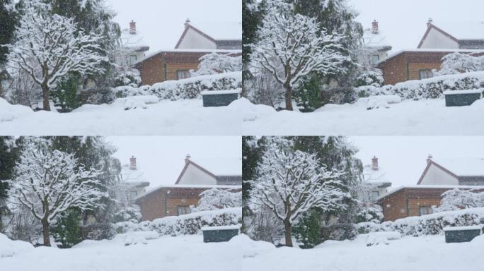 雪花覆盖着住宅别墅下雪