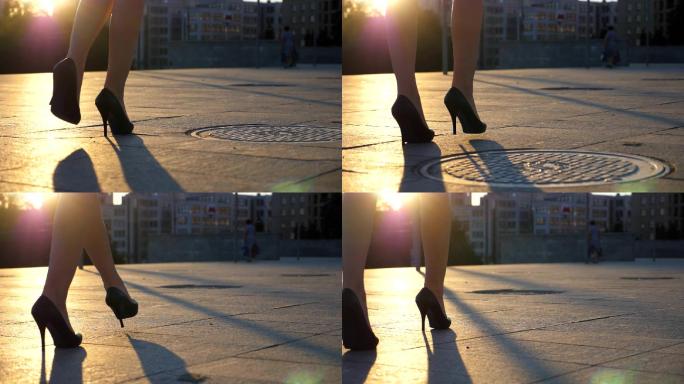 穿高跟鞋的女人夕阳脚步孤独