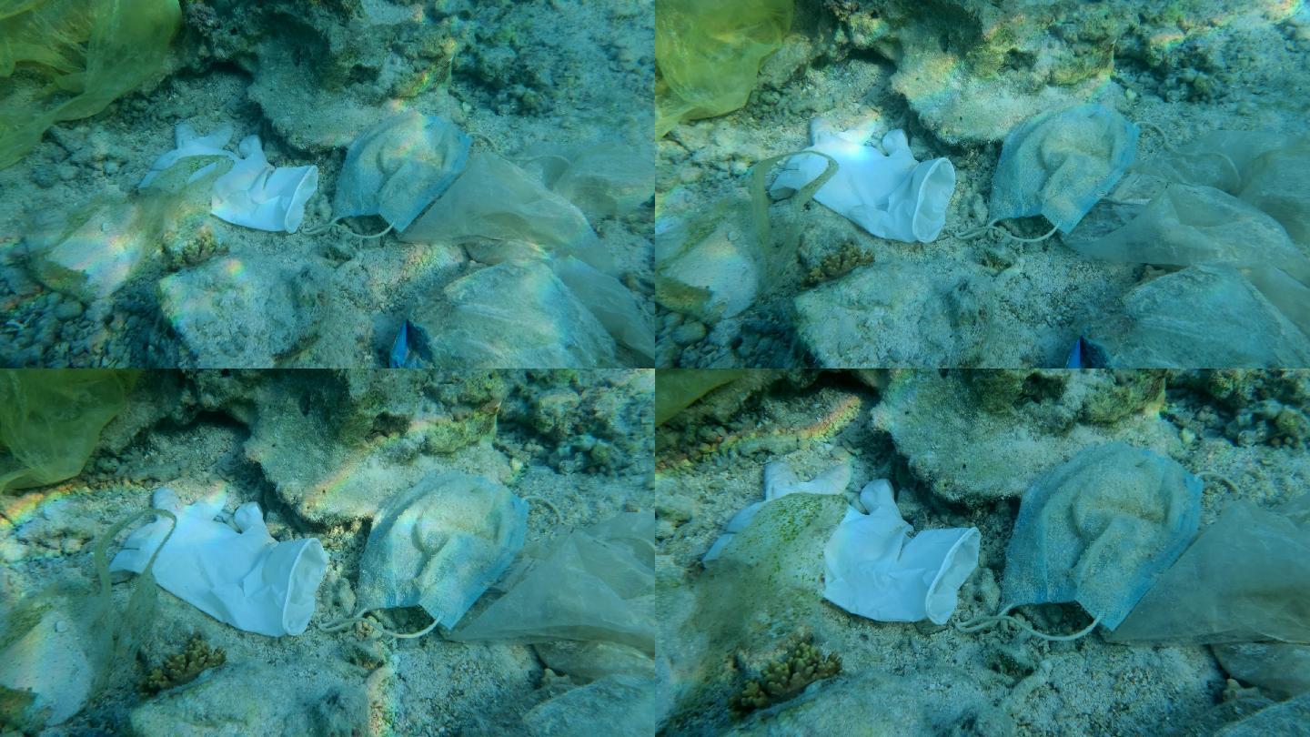 口罩、手套躺在红海的珊瑚海床上