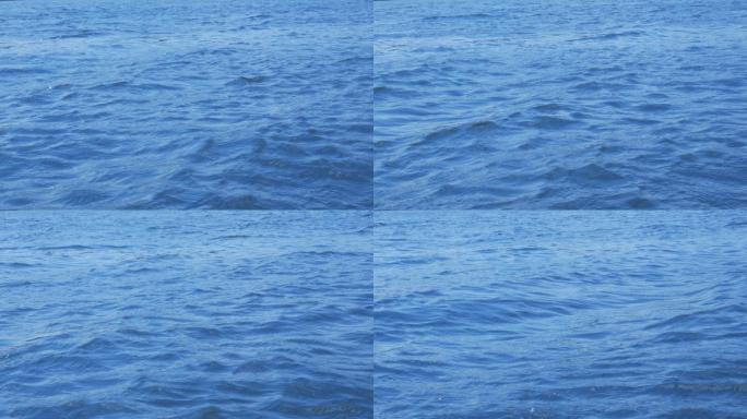 一片蓝色的水域滔滔江水海水海浪水波水纹