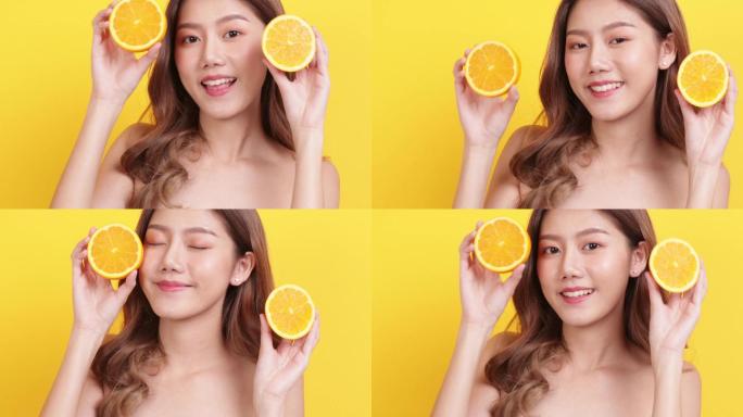 美女手握鲜橙女性时尚电商模特美女护肤广告