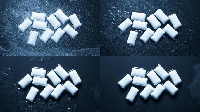 在冰中冷冻口香糖的特写镜头。