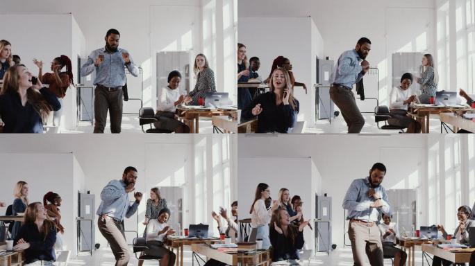 员工在办公室跳舞庆祝项目成功