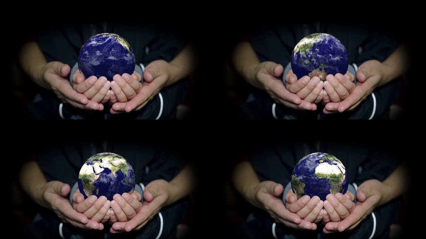 手握地球双手捧着地球地球仪地球转动