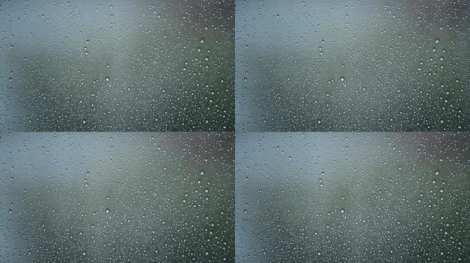 雨滴从房间的玻璃窗滑落