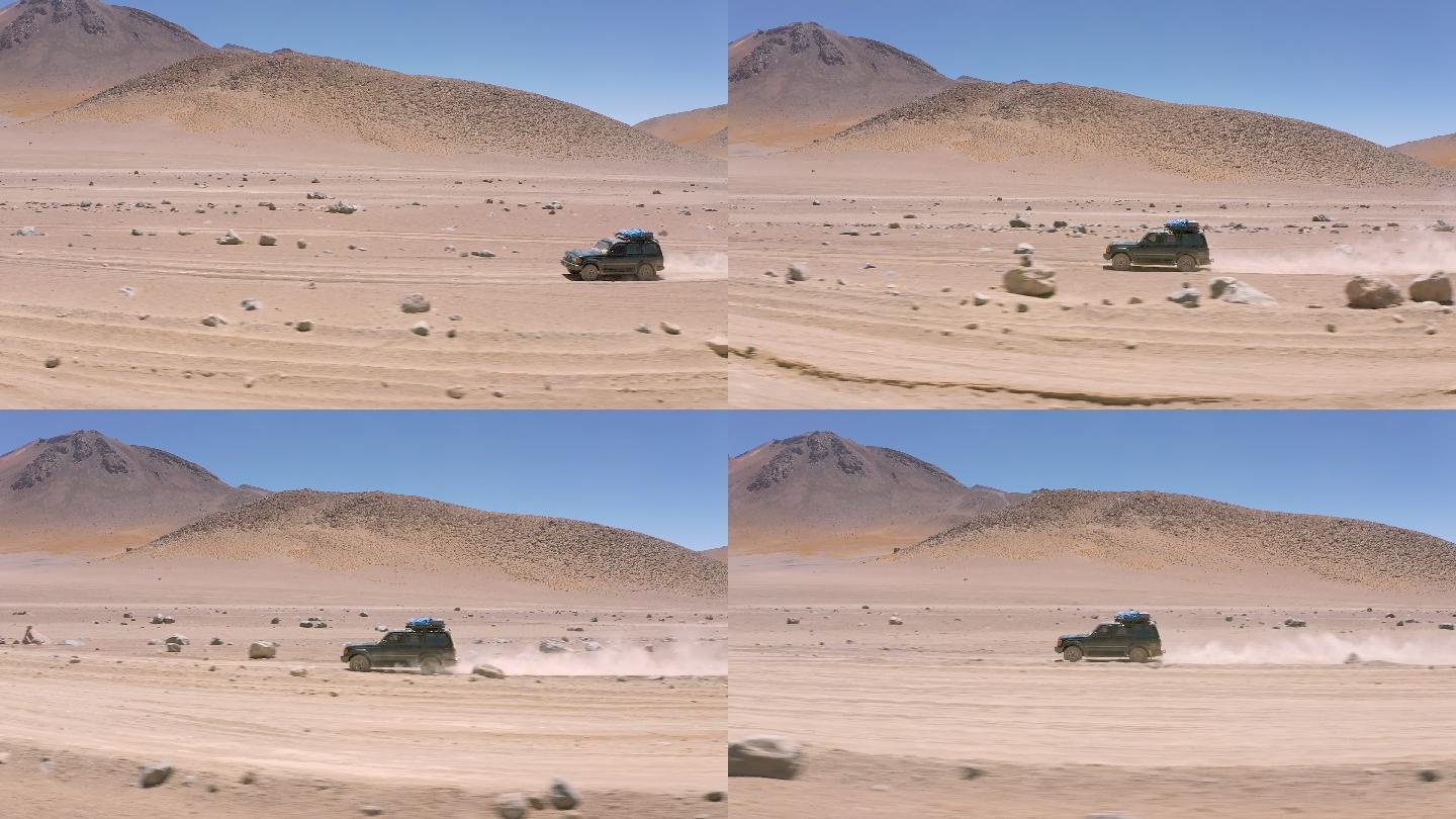 汽车行驶在奈利山附近大理沙漠的道路上