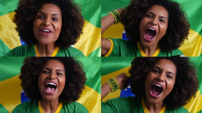 巴西女子举着巴西国旗庆祝