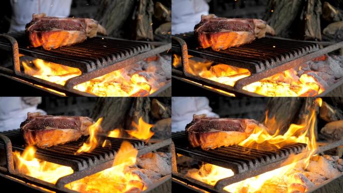 牛排在烤架上用火烤熟。