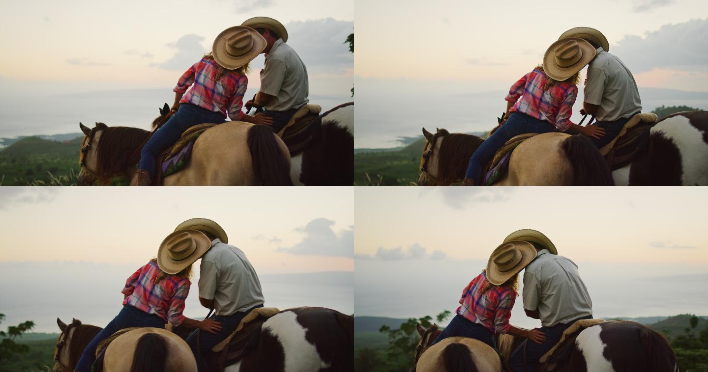 在日落时骑马的情侣接吻