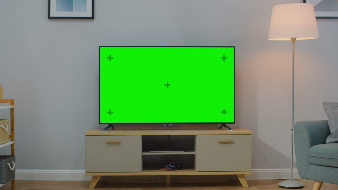 用水平绿色屏幕模型缩小电视镜头。