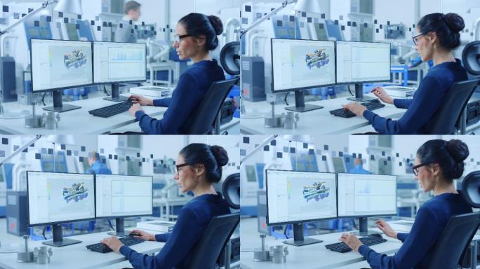 工业女性工程师在一台个人电脑上工作
