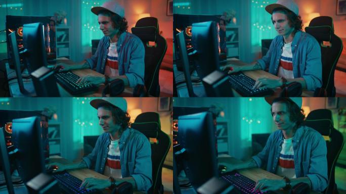 兴奋的玩家在他的个人电脑上玩在线游戏。