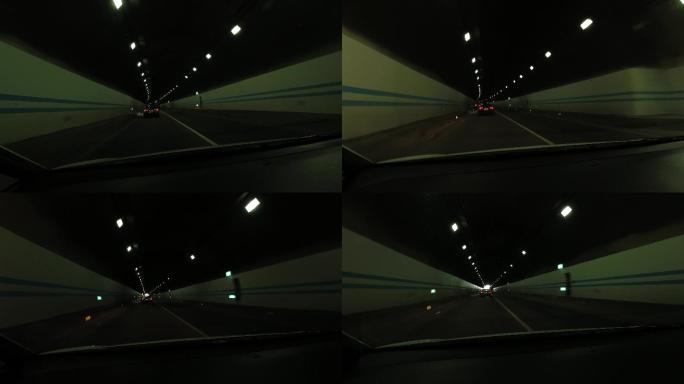 汽车行驶隧道驶出隧道一片白光