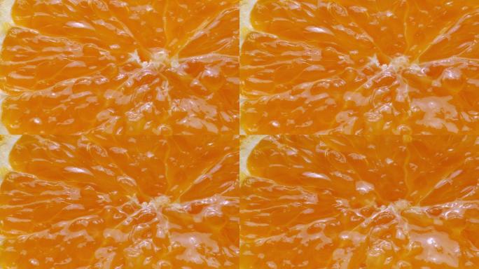 榨汁的柑橘水果慢动作入水创意特写主图视频