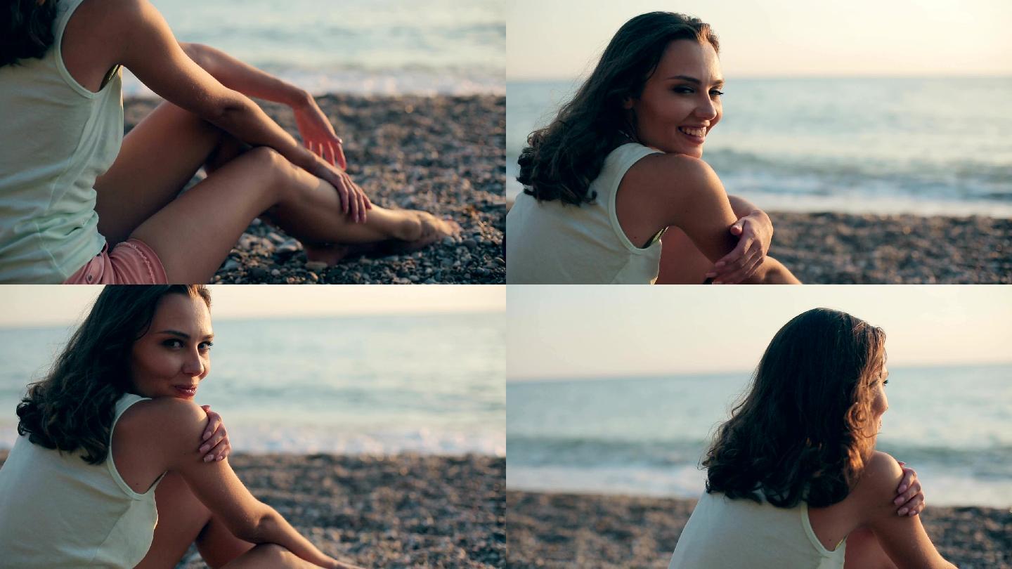 快乐的女孩坐在海边，面带微笑