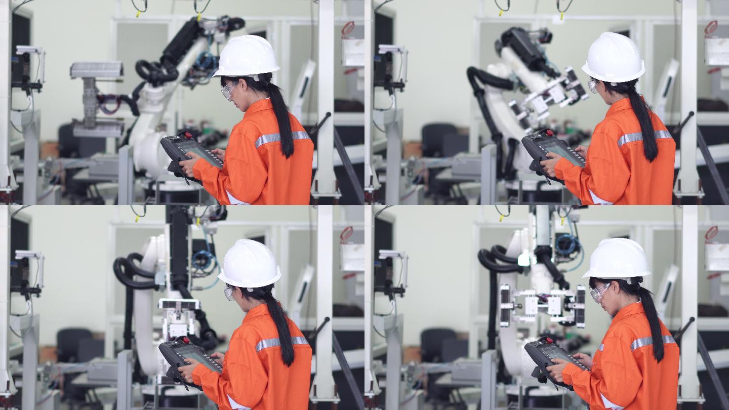 专业人员在制造厂的夹具上检查机器人