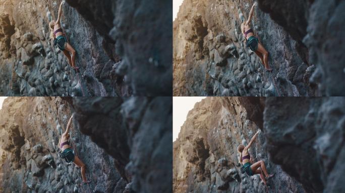 健身女子攀岩极限挑战勇敢