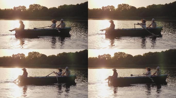 一家子在湖上划船划船女孩河流