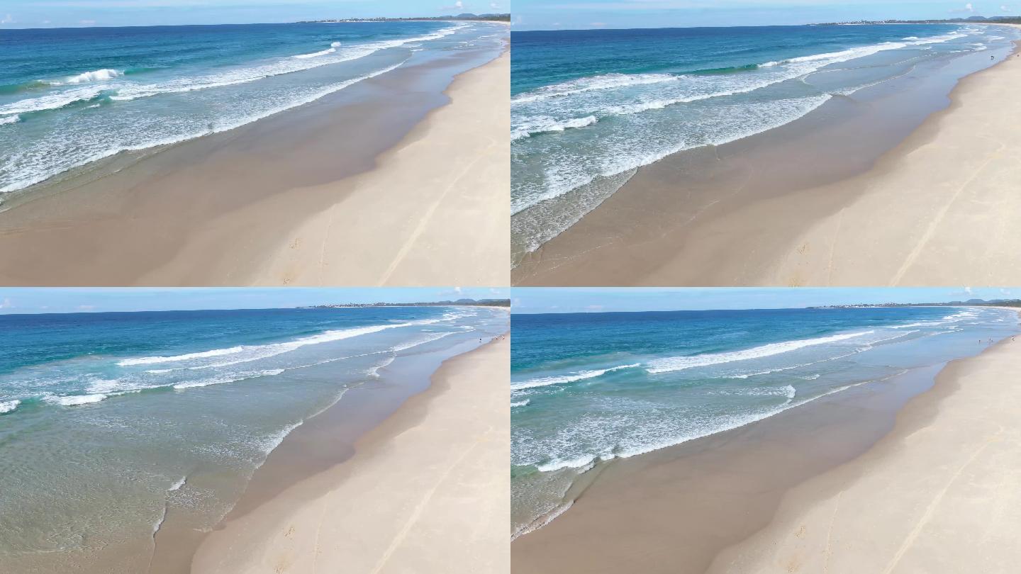 阳光下的沙滩海浪海水唯美空镜浪漫海边