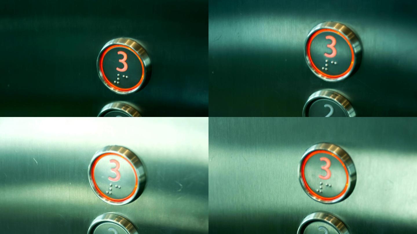手指按下电梯按钮。