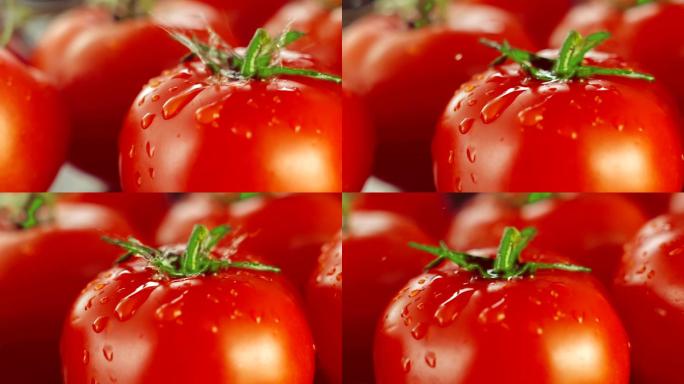 落在番茄上的水滴西红柿水滴在西红柿上新鲜
