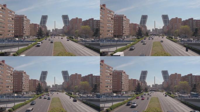 马德里的欧洲之门主干道车流穿梭建筑住宅