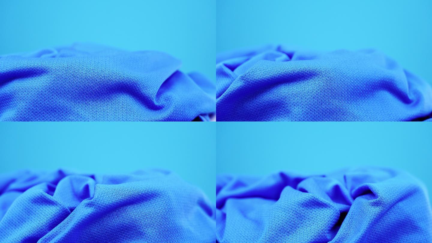 蓝色聚酯织物制成的时尚运动服产品
