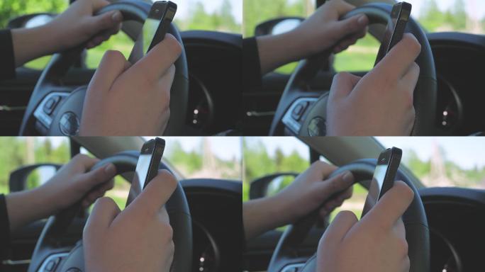 年轻司机使用黑色智能手机